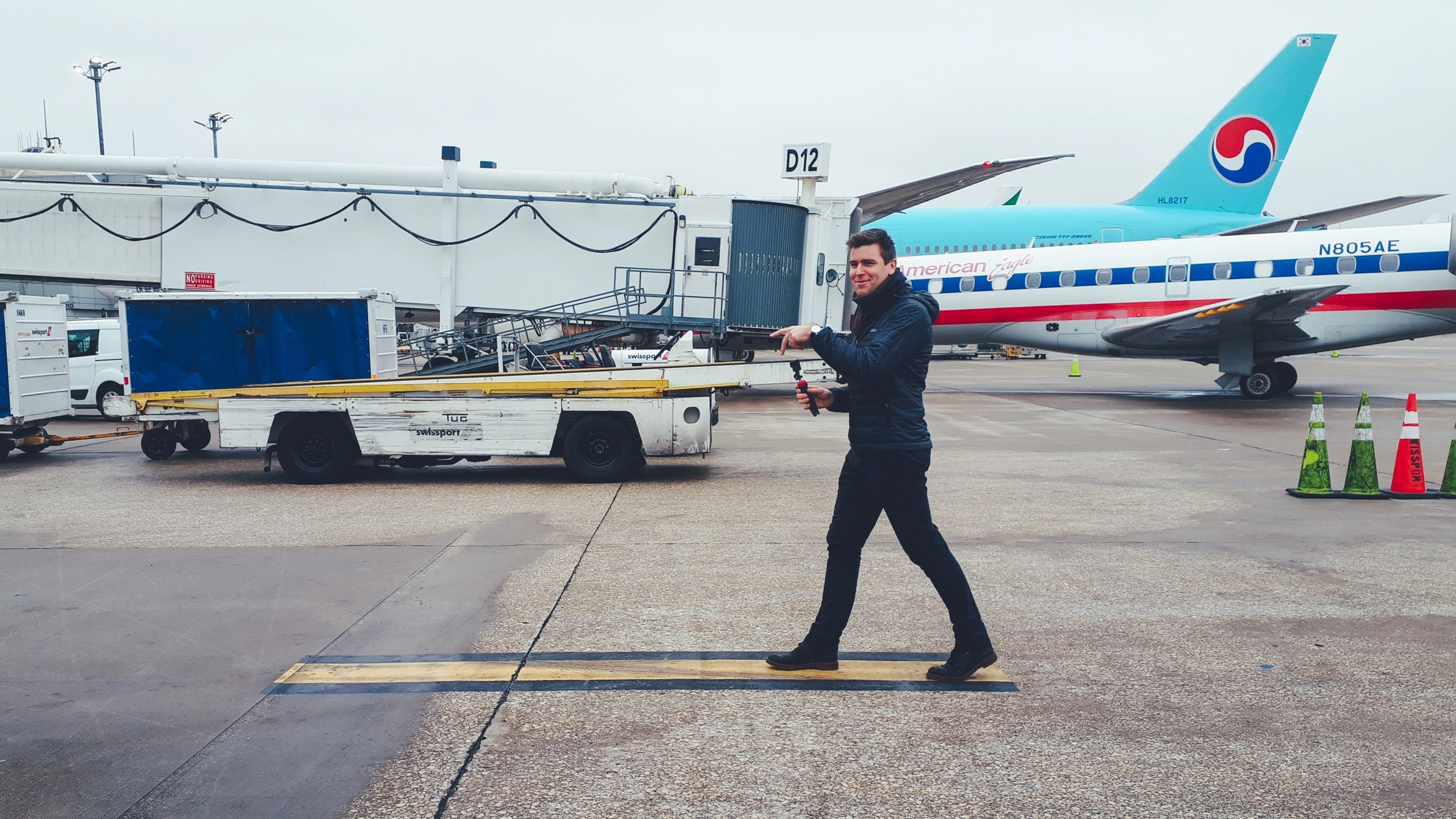 Myself, pretending to be an airplane on the ramp area of an airport